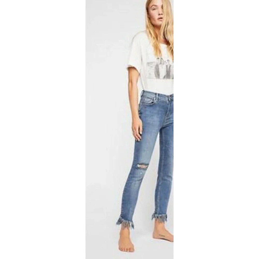 Free People light wash distressed diagonal raw‎ hem jeans size 30 new!!!